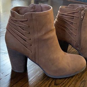Brown booties with lace up detail in back